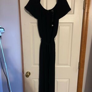 NWT. DKNY black jumpsuit with tie. Size 12